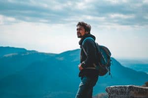 Solo man traveler backpacking